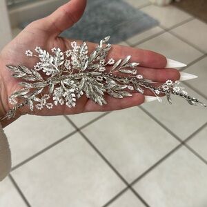 Crystal hair piece with silver and baby pearls. Not stiff. Works for every style